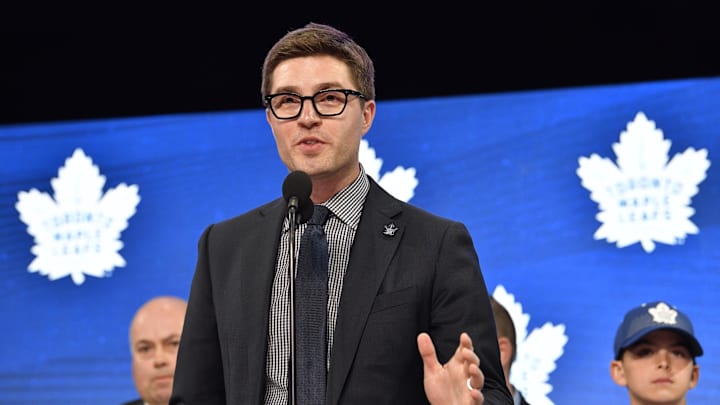 Jun 22, 2018; Dallas, TX, USA; Toronto Maple Leafs general manager Kyle Dubas announces the number twenty-nine overall pick in the first round of the 2018 NHL Draft at American Airlines Center. Mandatory Credit: Jerome Miron-Imagn Images