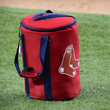 Apr 29, 2021; Arlington, Texas, USA; A view of the Boston Red Sox logo and a field bag during batting practice before the game between the Texas Rangers and the Boston Red Sox at Globe Life Field. Mandatory Credit: Jerome Miron-Imagn Images