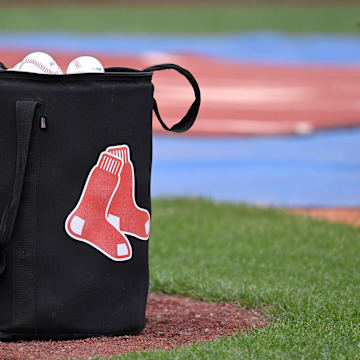 May 12, 2024; Boston, Massachusetts, USA;  A bag of baseballs sits on the diamond before a game against between the Boston Red Sox and the Washington Nationals at Fenway Park. Mandatory Credit: Eric Canha-Imagn Images