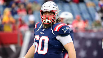 Dec 17, 2023; Foxborough, Massachusetts, USA; New England Patriots center David Andrews (60) warms up before a game against the Kansas City Chiefs  at Gillette Stadium. Mandatory Credit: Eric Canha-Imagn Images