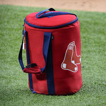 Apr 29, 2021; Arlington, Texas, USA; A view of the Boston Red Sox logo and a field bag during batting practice before the game between the Texas Rangers and the Boston Red Sox at Globe Life Field. Mandatory Credit: Jerome Miron-Imagn Images