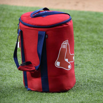 Apr 29, 2021; Arlington, Texas, USA; A view of the Boston Red Sox logo and a field bag during batting practice before the game between the Texas Rangers and the Boston Red Sox at Globe Life Field. Mandatory Credit: Jerome Miron-USA TODAY Sports