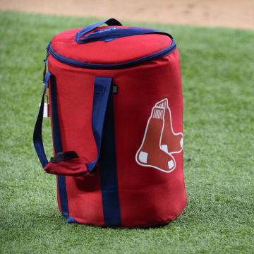 Apr 29, 2021; Arlington, Texas, USA; A view of the Boston Red Sox logo and a field bag during batting practice before the game between the Texas Rangers and the Boston Red Sox at Globe Life Field. Mandatory Credit: Jerome Miron-USA TODAY Sports