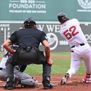 Jun 2, 2024; Boston, Massachusetts, USA;  Boston Red Sox right fielder Wilyer Abreu (52) hits a double against the Detroit Tigers during the first inning at Fenway Park.