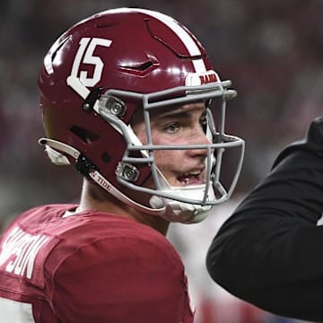 Aug 31, 2024; Tuscaloosa, Alabama, USA;  Alabama Crimson Tide quarterback Ty Simpson (15) talks with Alabama Crimson Tide head coach Kalen DeBoer.
