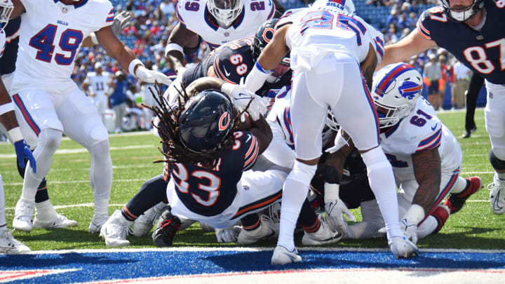 Aug 10, 2024; Orchard Park, New York, USA; Chicago Bears running back Ian Wheeler (33) scores a touchdown against the Buffalo Bills in the fourth quarter of a pre-season game at Highmark Stadium. Mandatory Credit: Mark Konezny-USA TODAY Sports