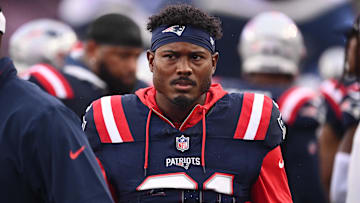 August 8, 2024; Foxborough, MA, USA;  New England Patriots cornerback Jonathan Jones (31) on the sideline during the first half against the Carolina Panthers at Gillette Stadium. Mandatory Credit: Eric Canha-Imagn Images