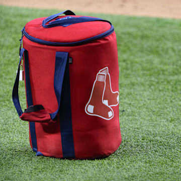 Apr 29, 2021; Arlington, Texas, USA; A view of the Boston Red Sox logo and a field bag during batting practice before the game between the Texas Rangers and the Boston Red Sox at Globe Life Field. Mandatory Credit: Jerome Miron-Imagn Images