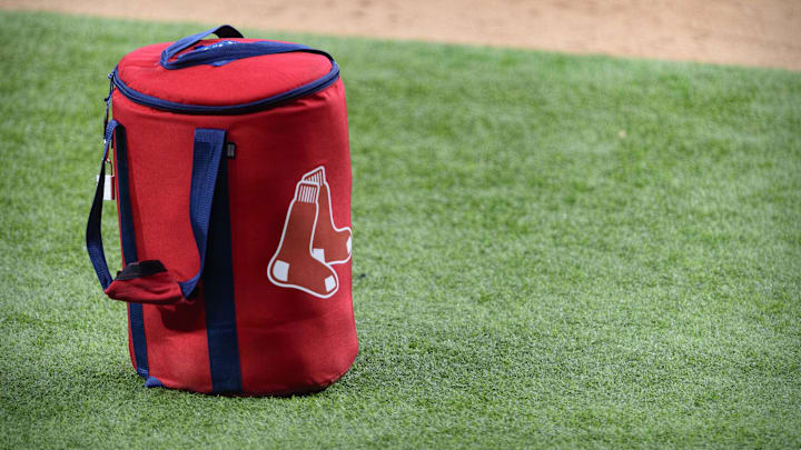 Apr 29, 2021; Arlington, Texas, USA; A view of the Boston Red Sox logo and a field bag during batting practice before the game between the Texas Rangers and the Boston Red Sox at Globe Life Field. Mandatory Credit: Jerome Miron-Imagn Images