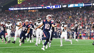 Aug 15, 2024; Foxborough, MA, USA; New England Patriots quarterback Drake Maye (10) runs the ball in for a touchdown against the Philadelphia Eagles during the first half at Gillette Stadium. Mandatory Credit: Eric Canha-Imagn Images