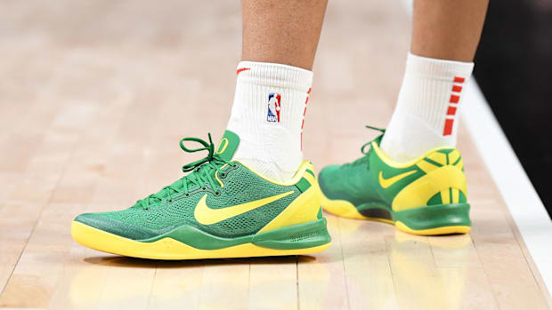 Dillon Brooks' green and yellow Nike sneakers.