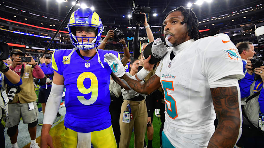 Los Angeles Rams quarterback Matthew Stafford (9) meets with Miami Dolphins cornerback Jalen Ramsey (5) following the game at SoFi Stadium.  | Gary A. Vasquez-Imagn Images