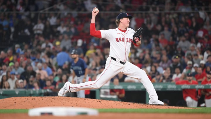 Jul 29, 2024; Boston, Massachusetts, USA; Boston Red Sox relief pitcher Trey Wingenter (61) pitches against the Seattle Mariners during the seventh inning at Fenway Park