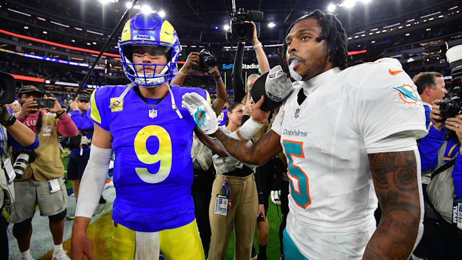 Los Angeles Rams quarterback Matthew Stafford (9) meets with Miami Dolphins cornerback Jalen Ramsey (5) following the game at SoFi Stadium last season. | Gary A. Vasquez-Imagn Images