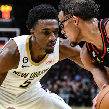 Nov 5, 2022; Atlanta, Georgia, USA; New Orleans Pelicans forward Herb Jones (5) pressures Atlanta Hawks guard Trae Young (11) in the third quarter at State Farm Arena. Mandatory Credit: Larry Robinson-Imagn Images