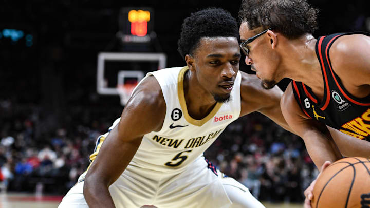 Nov 5, 2022; Atlanta, Georgia, USA; New Orleans Pelicans forward Herb Jones (5) pressures Atlanta Hawks guard Trae Young (11) in the third quarter at State Farm Arena. Mandatory Credit: Larry Robinson-Imagn Images