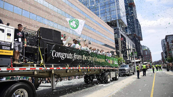 Jun 21, 2024; Boston, MA, USA;  Confetti flies through the air during the Boston Celtics championship parade. Mandatory Credit: Bob DeChiara-USA TODAY Sports