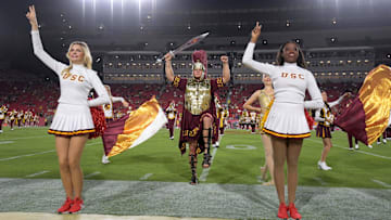 Sep 21, 2018; Los Angeles, CA, USA; Southern California Trojans song girls cheerleaders and mascot Tommy Trojan perform in the first quarter against the Washington State Cougars at Los Angeles Memorial Coliseum. Mandatory Credit: Kirby Lee-USA TODAY Sports