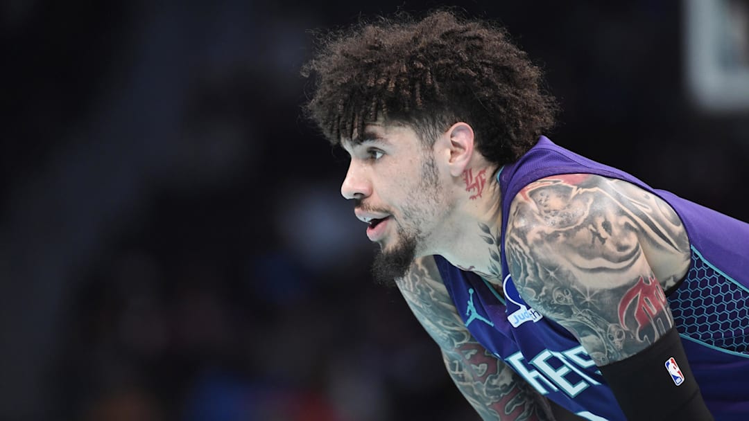 Nov 26, 2025; Charlotte, North Carolina, USA;  Charlotte Hornets guard LaMelo Ball (1) in a time out during the first half against the New York Knicks at the Spectrum Center. Mandatory Credit: Sam Sharpe-Imagn Images
