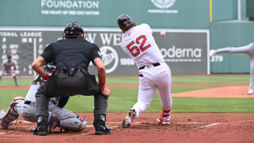 Jun 2, 2024; Boston, Massachusetts, USA;  Boston Red Sox right fielder Wilyer Abreu (52) hits a double against the Detroit Tigers during the first inning at Fenway Park. Mandatory Credit: Eric Canha-USA TODAY Sports