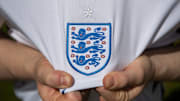 The England International Badge on their Home Shirt