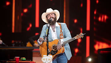 Post Malone performs at Grand Ole Opry in Nashville , Tenn., Wednesday, Aug. 14, 2024.