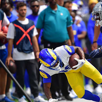 Aug 11, 2024; Inglewood, California, USA; Los Angeles Rams wide receiver Xavier Smith (19) is pushed out of bounds by Dallas Cowboys cornerback Caelen Carson (41) during the first half at SoFi Stadium. 