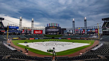 May 13, 2024; Chicago, Illinois, USA; General view of the sky and rain tarp as the Chicago White Sox and Washington Nationals game is postponed until tomorrow due to rain at Guaranteed Rate Field.