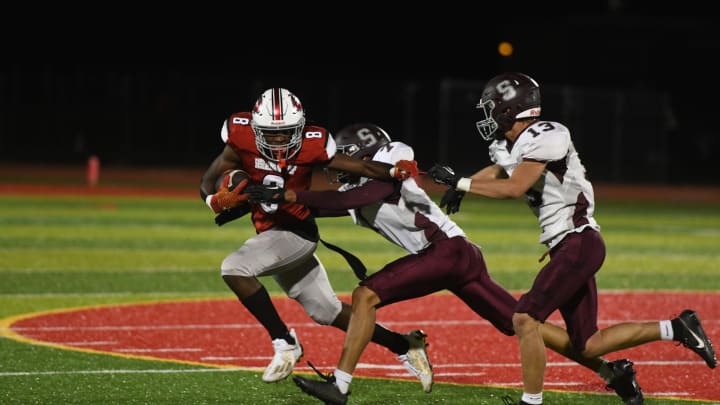 Susquehanna Township running back Lex Cyrus carries the ball in a game against Shippensburg. 