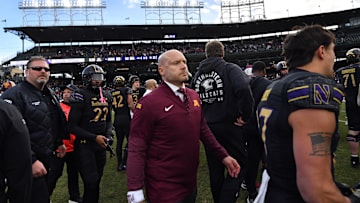 Nov 22, 2025; Chicago, Illinois, USA; Minnesota Golden Gophers head coach P.J. Fleck walks off the field after the game against the Northwestern Wildcats at Wrigley Field. Mandatory Credit: Patrick Gorski-Imagn Images
