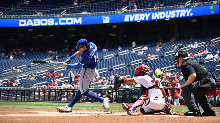 Jun 17, 2026; Washington, District of Columbia, USA; Kansas City Royals right fielder Jac Caglianone (14) singles against the Washington Nationals during the first inning at Nationals Park. Mandatory Credit: Brad Mills-Imagn Images