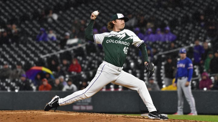 May 11, 2024; Denver, Colorado, USA; Colorado Rockies pitcher Nick Mears (46) throws against the Texas Rangers in the ninth inning at Coors Field. Mandatory Credit: John Leyba-USA TODAY Sports