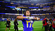Dec 8, 2024; Inglewood, California, USA; Los Angeles Rams wide receiver Puka Nacua (17) celebrates the victory against the Buffalo Bills at SoFi Stadium. Mandatory Credit: Gary A. Vasquez-Imagn Images