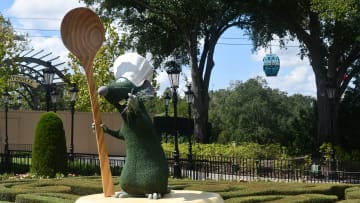 Remmy topiary greets guests at the entrance to the France pavilion at Epcot Photo by Brian Miller