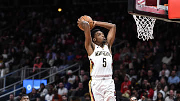 Nov 5, 2022; Atlanta, Georgia, USA; New Orleans Pelicans forward Herb Jones (5) dunks against the New Orleans Pelicans in the second quarter at State Farm Arena. Mandatory Credit: Larry Robinson-Imagn Images