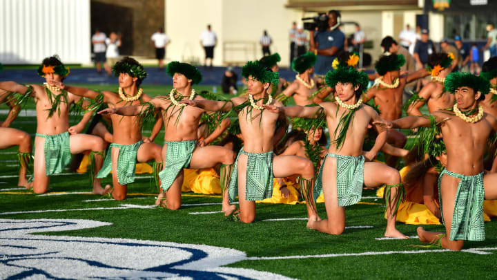 Hula dancers perform at the Polynesian Bowl