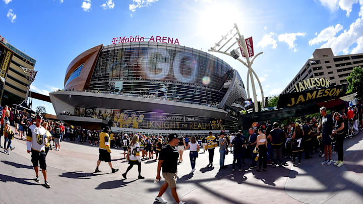 Jun 5, 2023; Las Vegas, Nevada, USA; Spectators gather outside T-Mobile Arena before game two of the 2023 Stanley Cup Final between the Vegas Golden Knights and Florida Panthers. Mandatory Credit: Gary A. Vasquez-Imagn Images