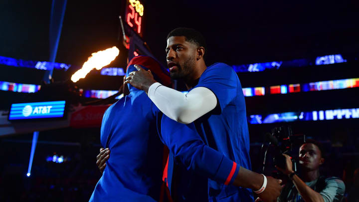 Oct 23, 2022; Los Angeles, California, USA; Los Angeles Clippers guard Paul George (13) is greeted by guard Reggie Jackson (1) before playing against the Phoenix Suns at Crypto.com Arena. Mandatory Credit: Gary A. Vasquez-USA TODAY Sports