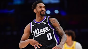 Mar 6, 2024; Los Angeles, California, USA;  Sacramento Kings guard Malik Monk (0) reacts after scoring a three point basket against the against the Los Angeles Lakers during the second half at Crypto.com Arena. Mandatory Credit: Gary A. Vasquez-Imagn Images