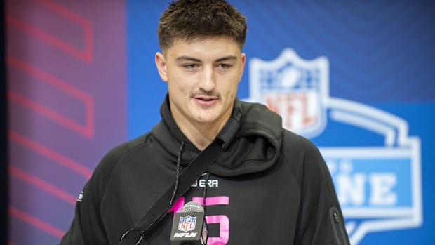 Michigan tight end Colston Loveland speaks during the 2025 NFL Combine at Lucas Oil Stadium.