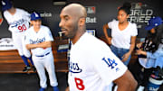 Los Angeles Lakers former player Kobe Bryant in the dugout before game four of the 2018 World Series between the Los Angeles Dodgers and the Boston Red Sox at Dodger Stadium. 