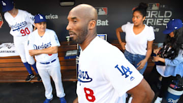 Los Angeles Lakers former player Kobe Bryant in the dugout before game four of the 2018 World Series between the Los Angeles Dodgers and the Boston Red Sox at Dodger Stadium. 