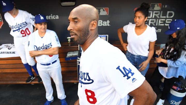 Los Angeles Lakers former player Kobe Bryant in the dugout before game four of the 2018 World Series between the Los Angeles Dodgers and the Boston Red Sox at Dodger Stadium. 