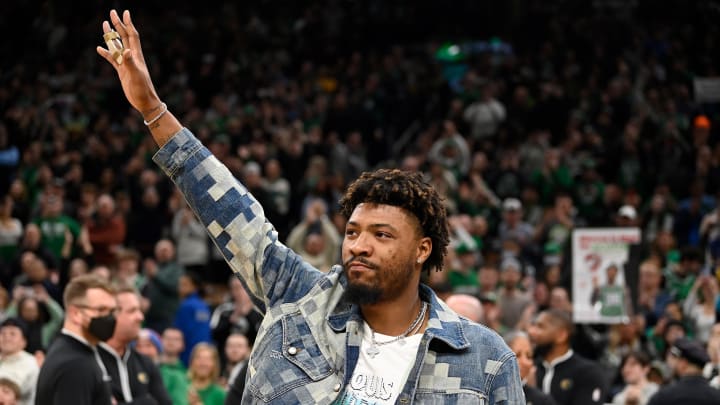 Feb 4, 2024; Boston, Massachusetts, USA;  Memphis Grizzlies guard Marcus Smart (36) waves to fans during the first half against the Boston Celtics at TD Garden. Mandatory Credit: Eric Canha-USA TODAY Sports