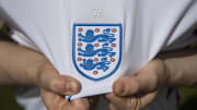 The England International Badge on their Home Shirt
