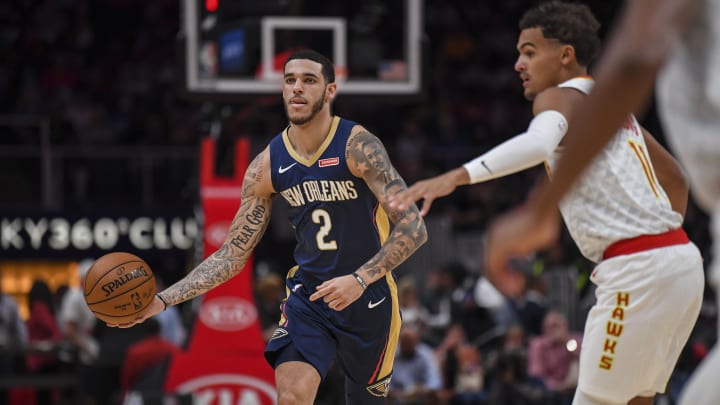 Oct 7, 2019; Atlanta, GA, USA; New Orleans Pelicans guard Lonzo Ball (2) dribbles against Atlanta Hawks guard Trae Young (11) during the first quarter at State Farm Arena. Mandatory Credit: Dale Zanine-USA TODAY Sports