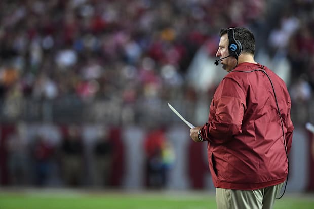 Arkansas Razorbacks head coach Bret Bielema looks on from the sidelines against the Alabama Crimson Tide.