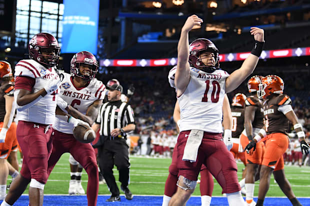 Diego Pavia celebrates a New Mexico State touchdown against Bowling Green in the 2022 Quick Lane Bowl.