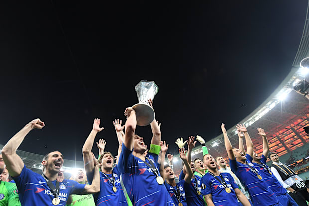 Chelsea squad members celebrating.