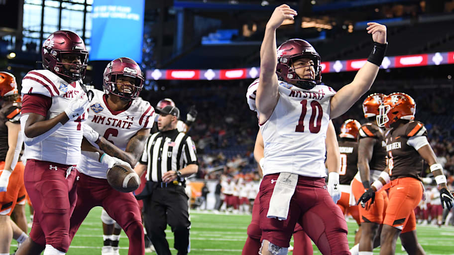 Diego Pavia celebrates a New Mexico State touchdown against Bowling Green in the 2022 Quick Lane Bowl.